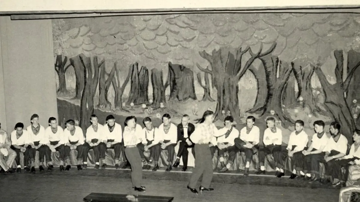 Historic photo: student performance with painted backdrop